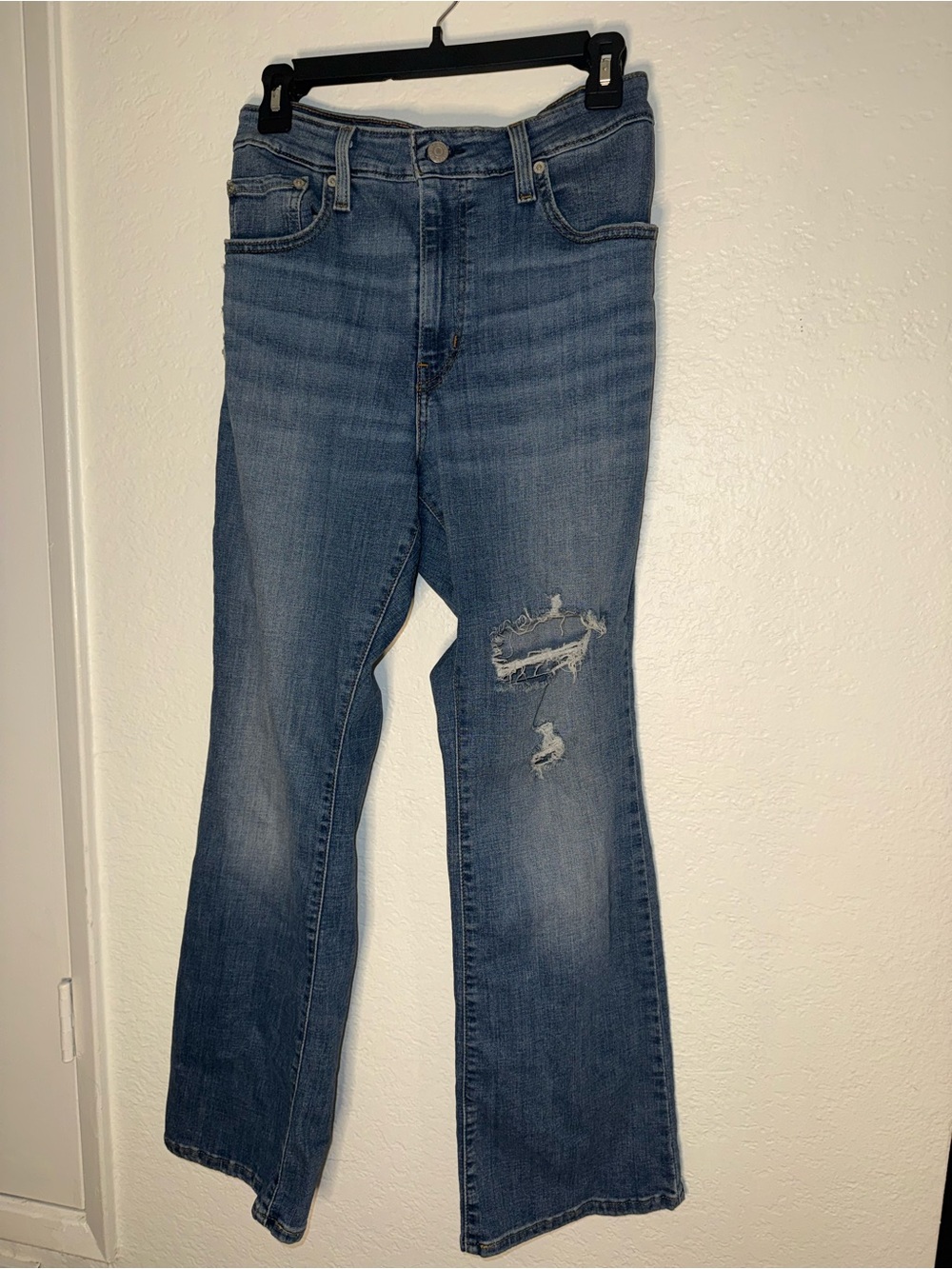 Levi's Men's Blue Bootcut Jeans with Knee Distress